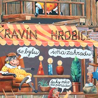 Veselá venkovní malba na zdi poutající na prodej nábytku v Kravíně Hrobice, krávy